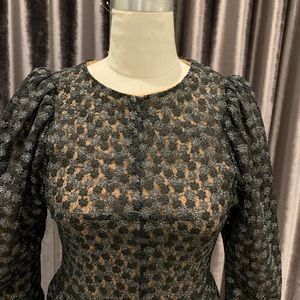 Only worn once elegant dress with a beautiful shiny fabric